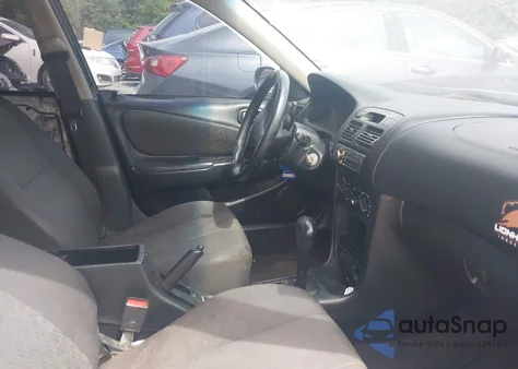 2002 Toyota Corolla S from USA, damaged, VIN 1NXBR12E52Z654660